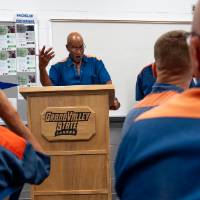 Student delivering presentation during class